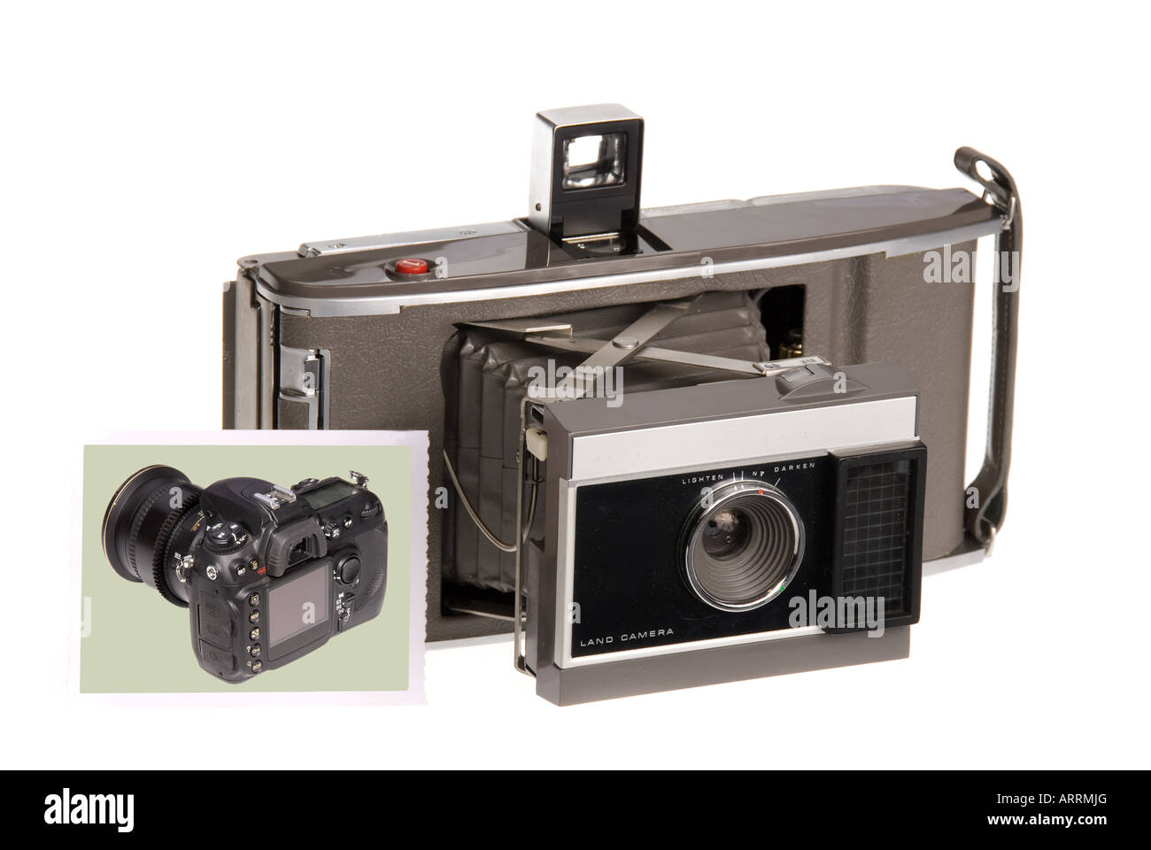 An early 1960s era Polaroid camera spits out a Polaroid print Stock Photo