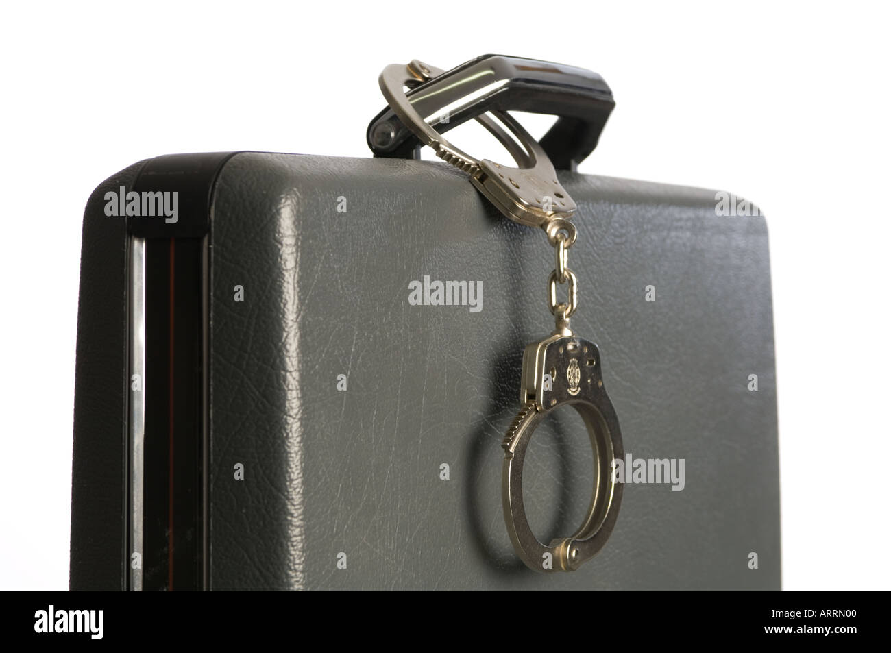 handcuffs and briefcase Stock Photo Alamy