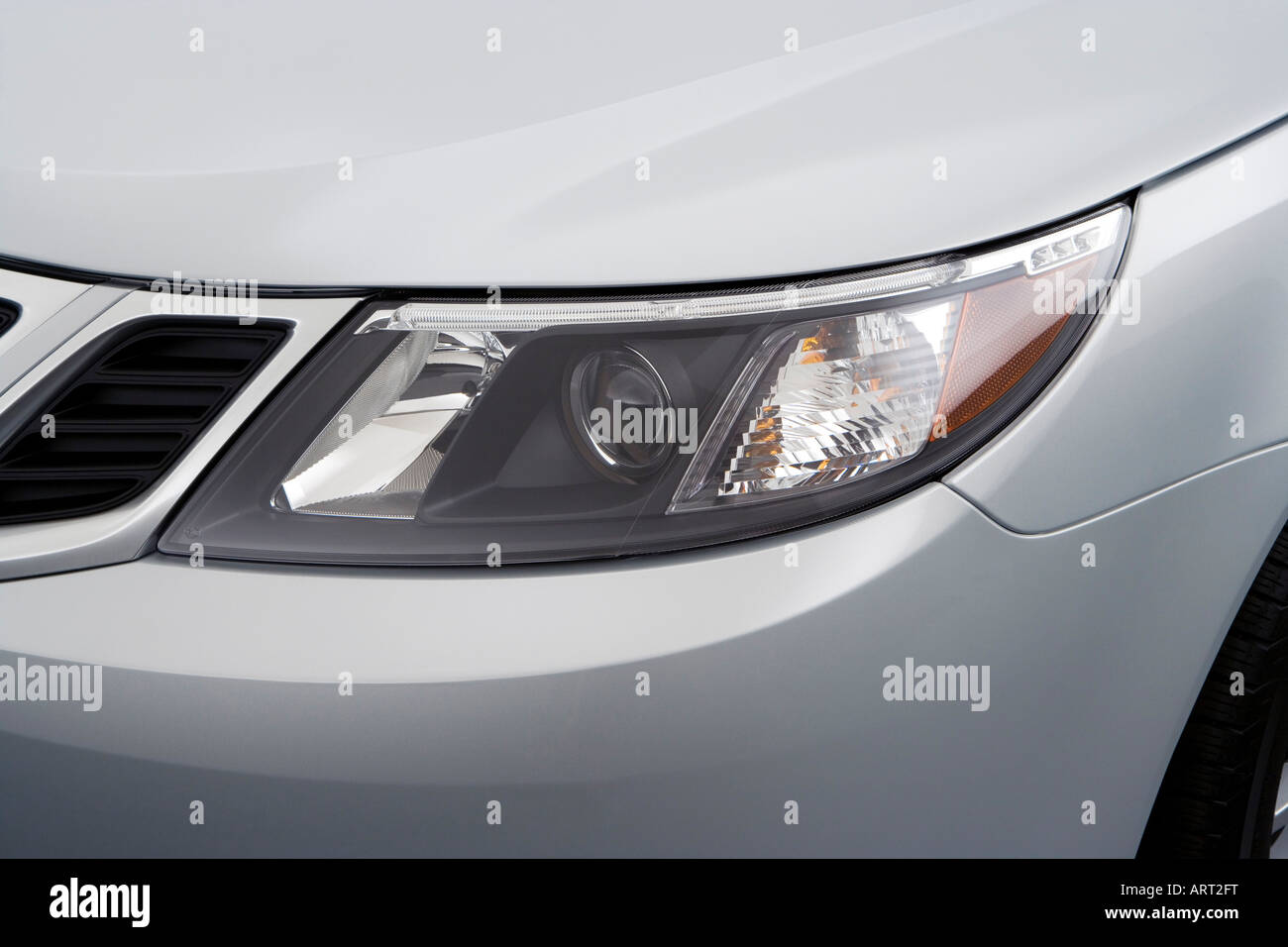 2008 Saab 9-3 Sport Combi in Silver - Headlight Stock Photo