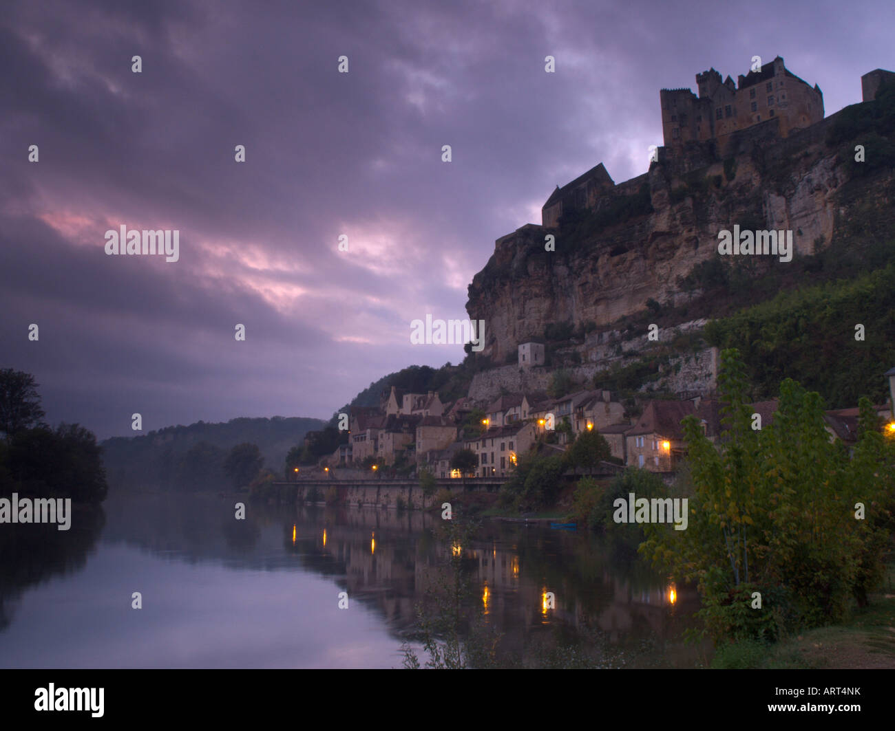 View of Beynac Castle and River Dordogne in Perigord, France at sunset Stock Photo
