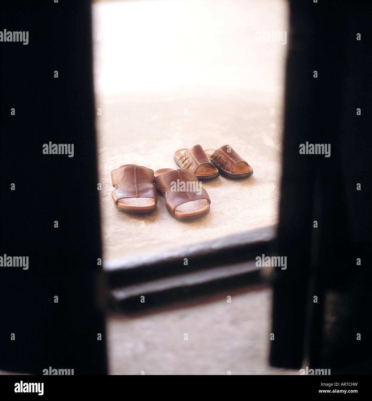 Shoes outside a mosque Stock Photo Alamy