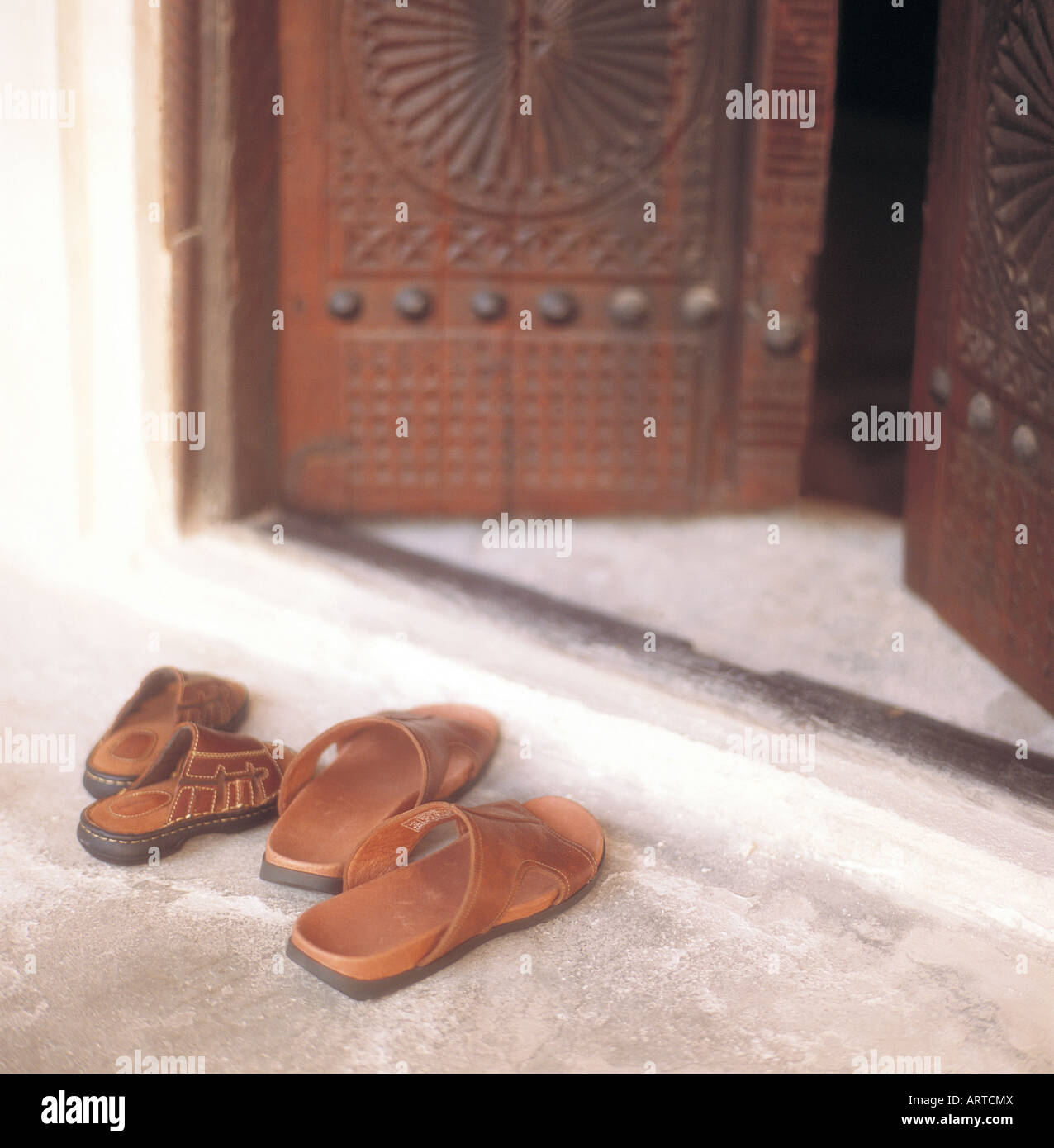Shoes outside a mosque hires stock photography and images Alamy