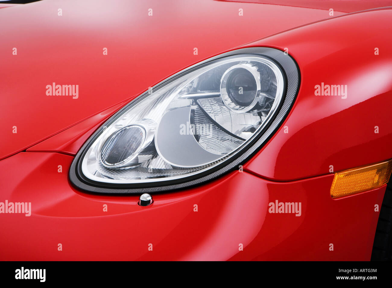 2008 Porsche Cayman S in Red - Headlight Stock Photo
