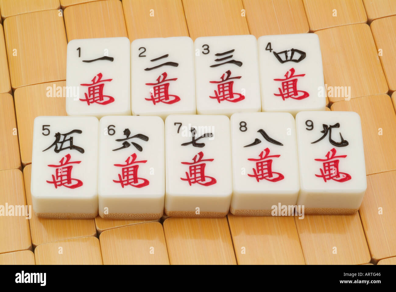 Mah Jongg tiles pieces  numbers 1 2 3 4 5 6 7 8 9 one two three four five six seven eight nine Stock Photo