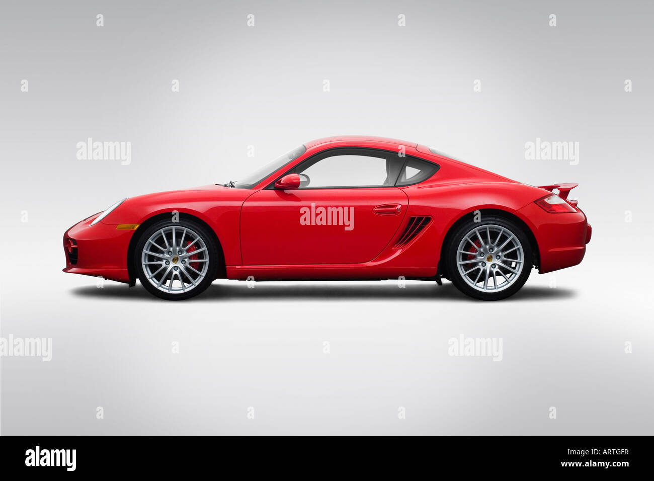 2008 Porsche Cayman S in Red - Drivers Side Profile Stock Photo