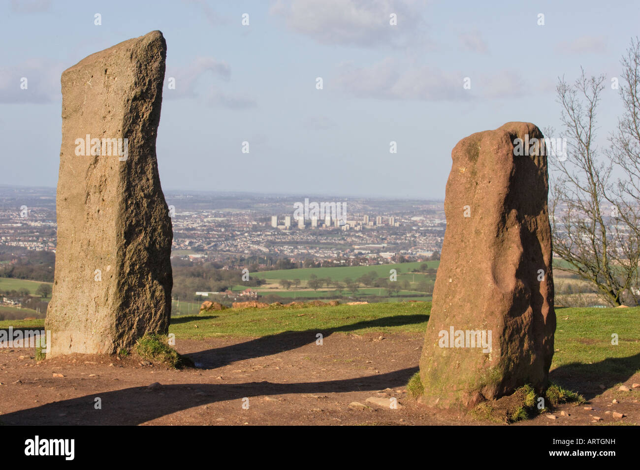 Two of the Four Stones Clent Hills with the tower blocks of Brierley Hill Dudley in the distance. Stock Photo