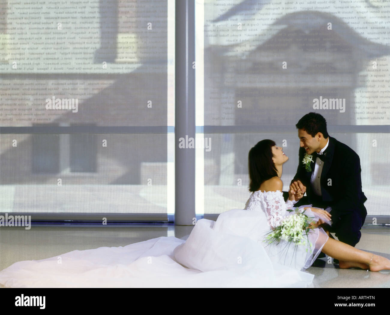 Wedding bride groom sitting hi-res stock photography and images - Alamy