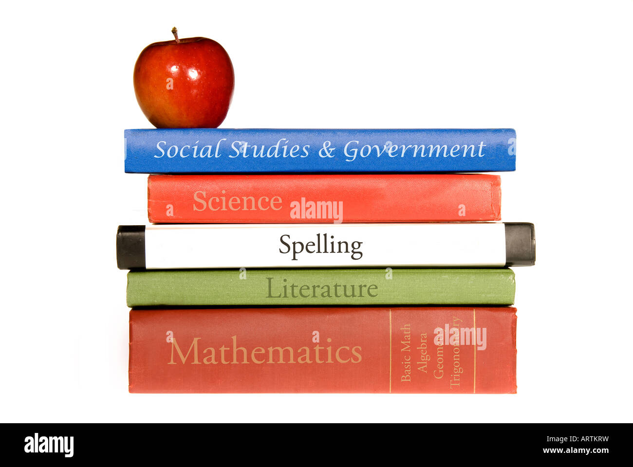 A set of old school books shown with a symbolic apple for the teacher Stock Photo