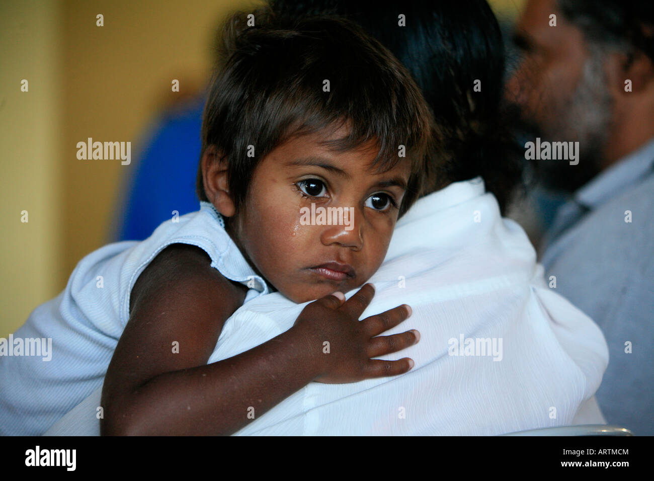 Aboriginal boy crying Stock Photo - Alamy