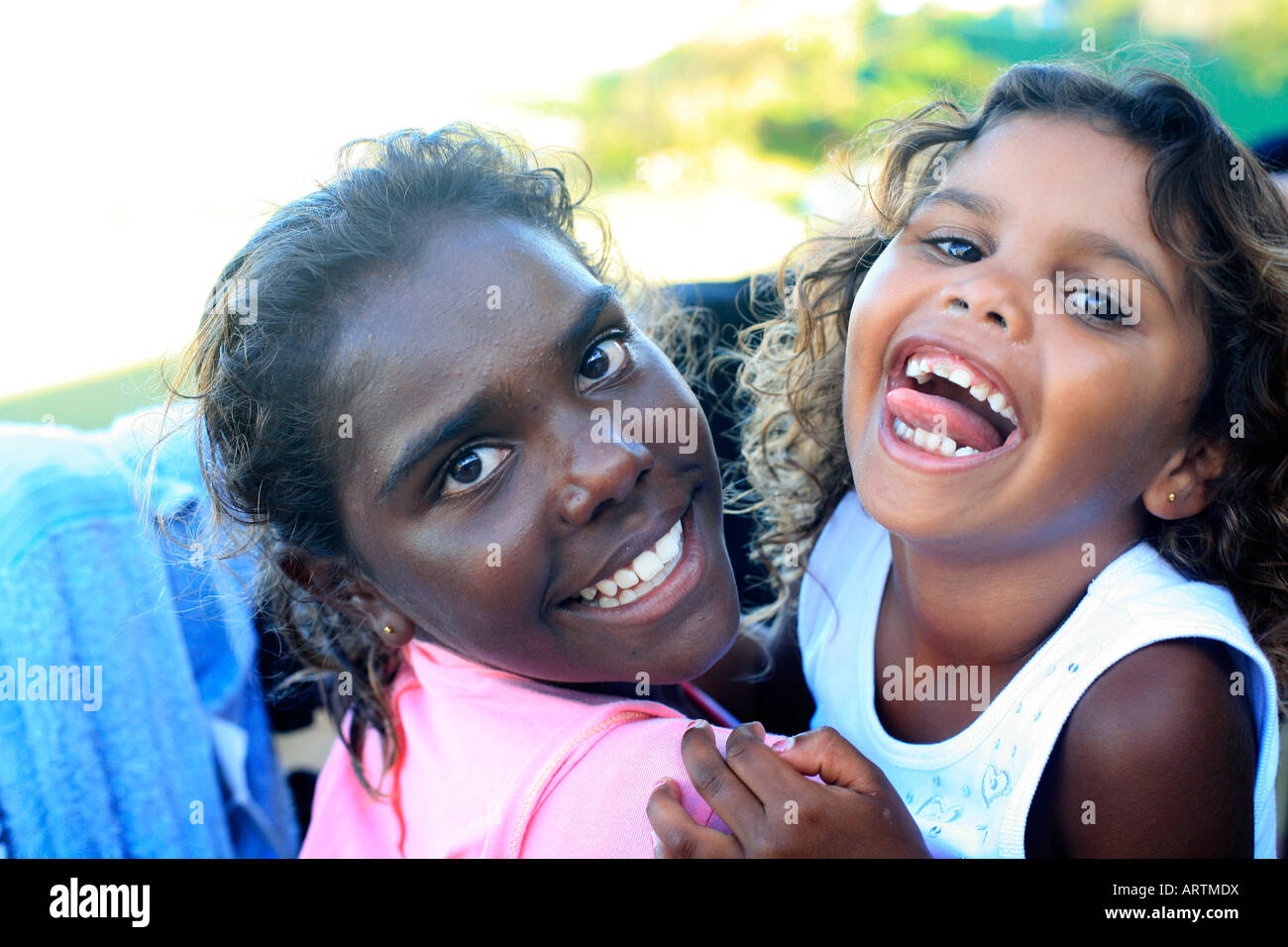 Smiling happy Australia Aboriginal girls. Stock Photo