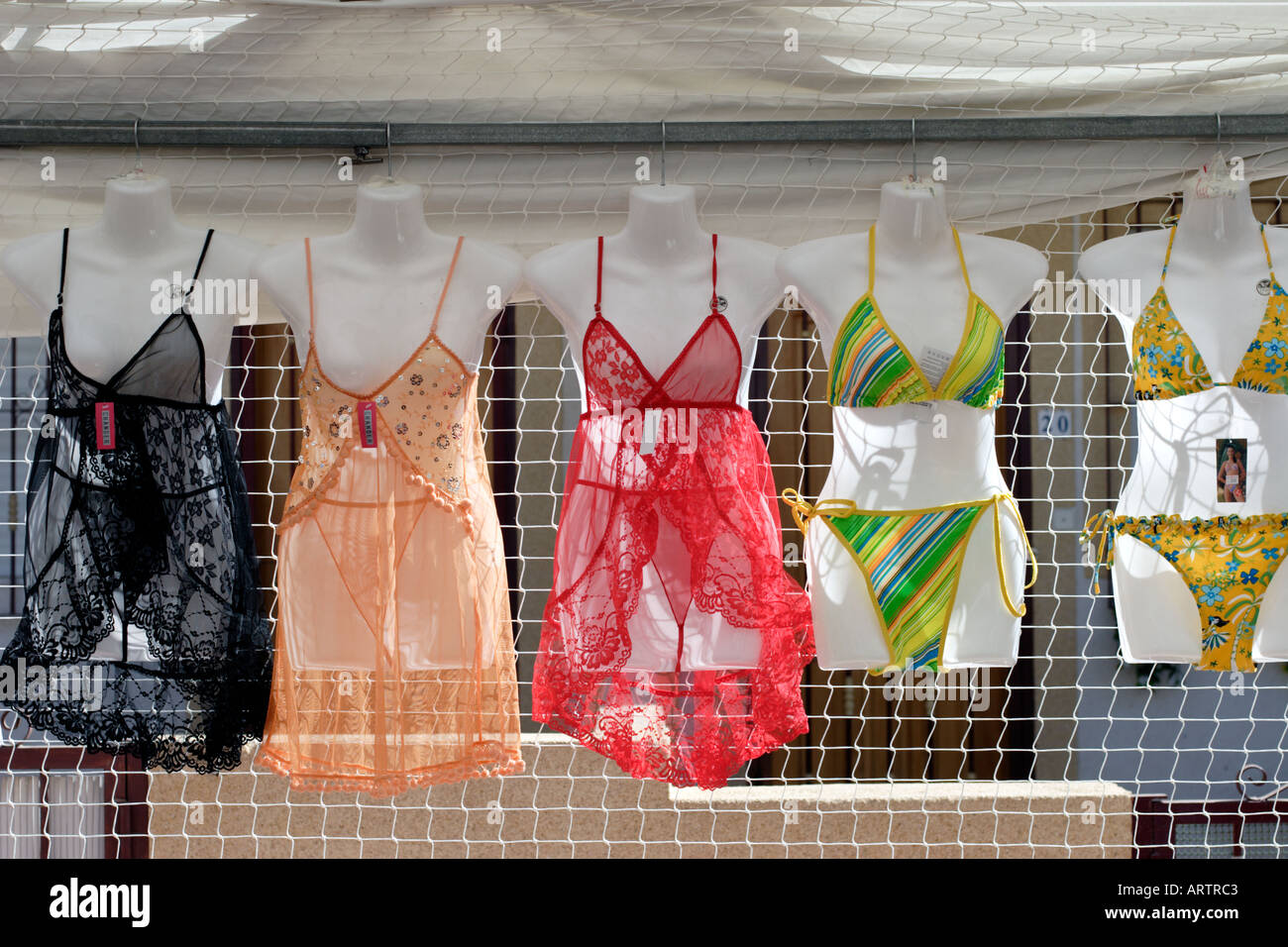 Womens nightwear and swimwear on display at Costa Blanca street market Spain  Stock Photo - Alamy