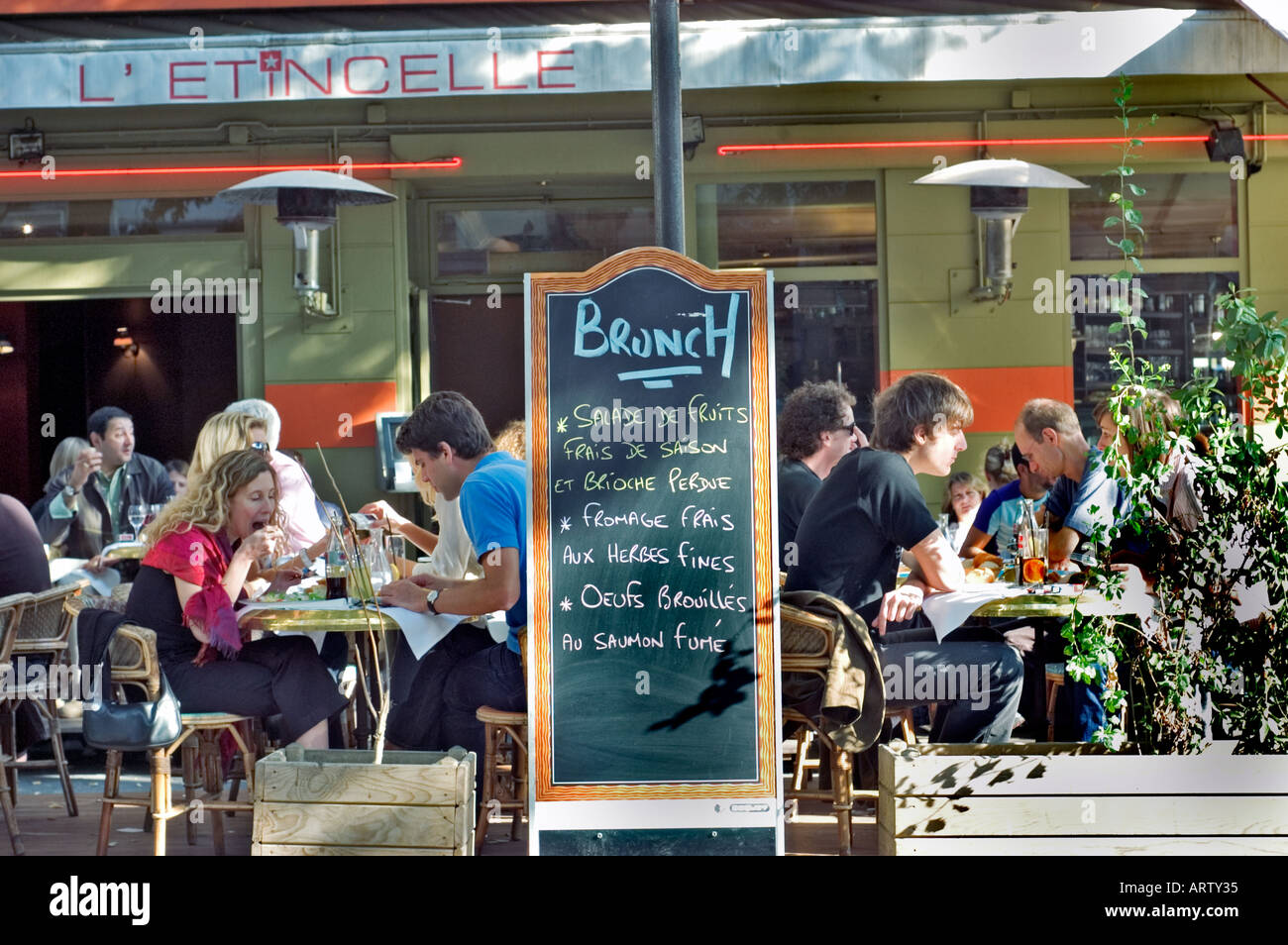 Paris France Young Adults Sharing Meals French Bistro Cafe Stock