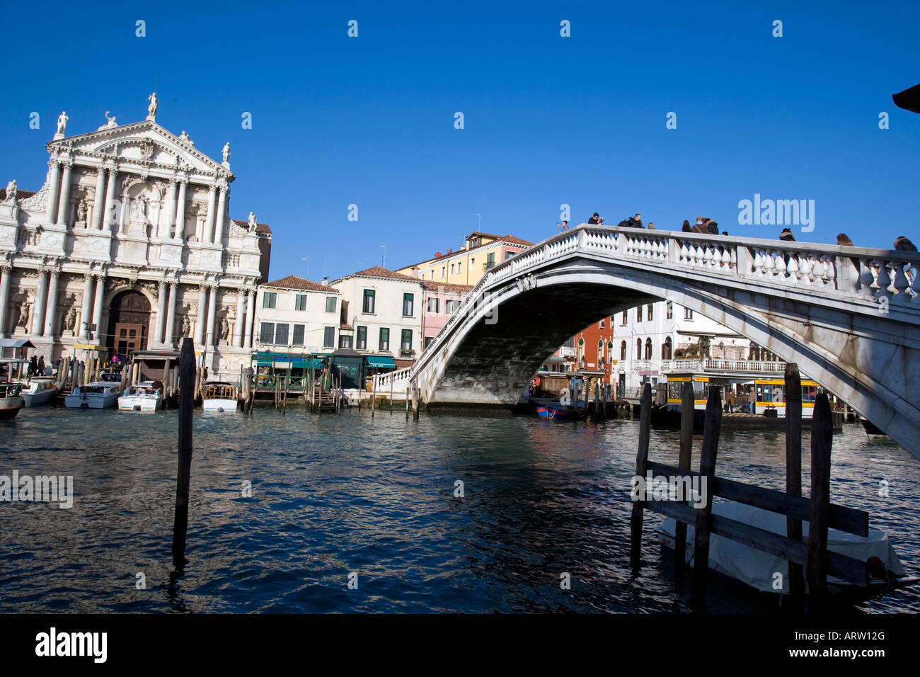 The Ponti dei Scalzi crosses the Grand Canal with the Chiesa del Scalzi in Venice Italy Italia December 4 2007 Stock Photo