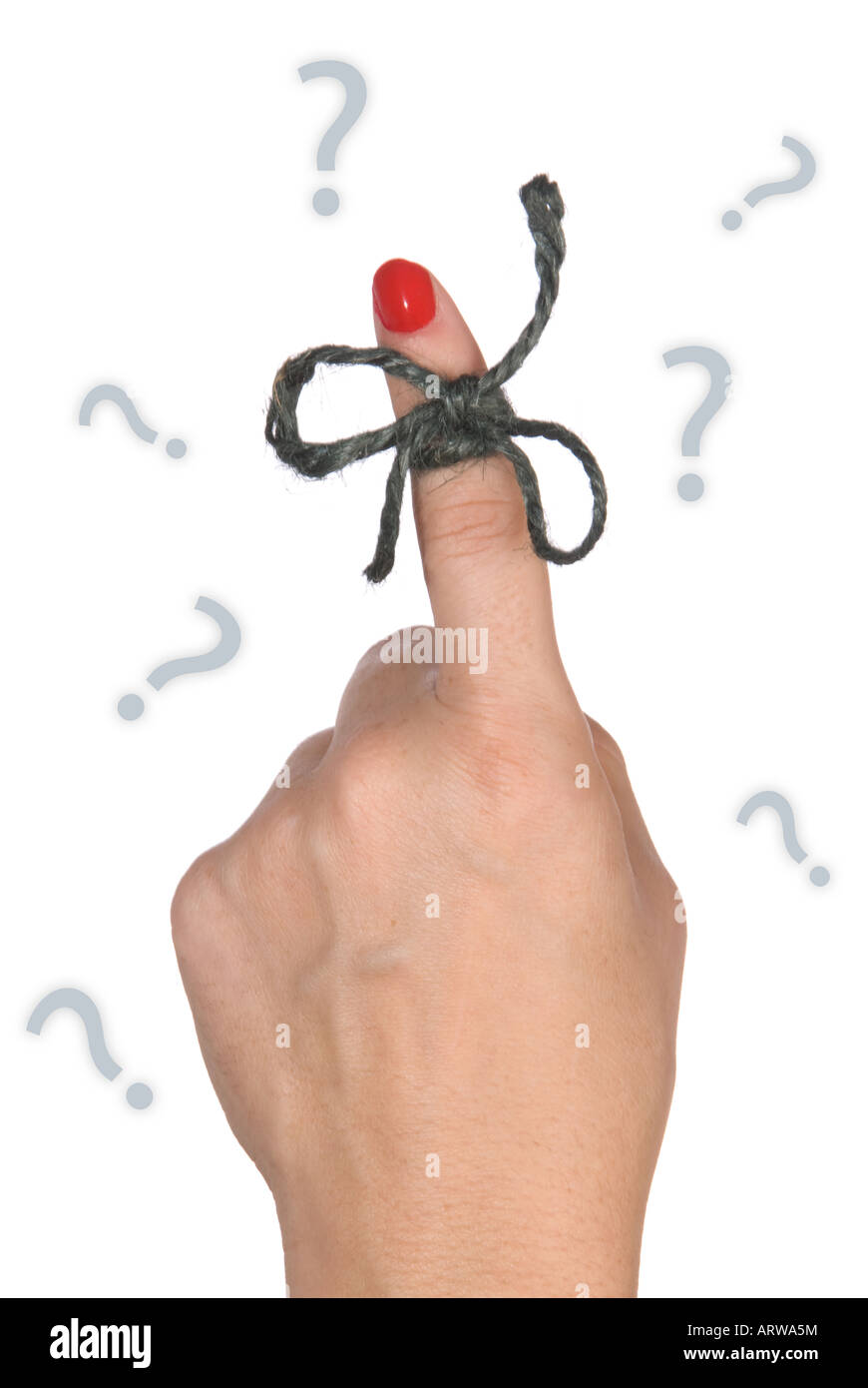 A finger contains a bow tied string as a reminder to perform a specific