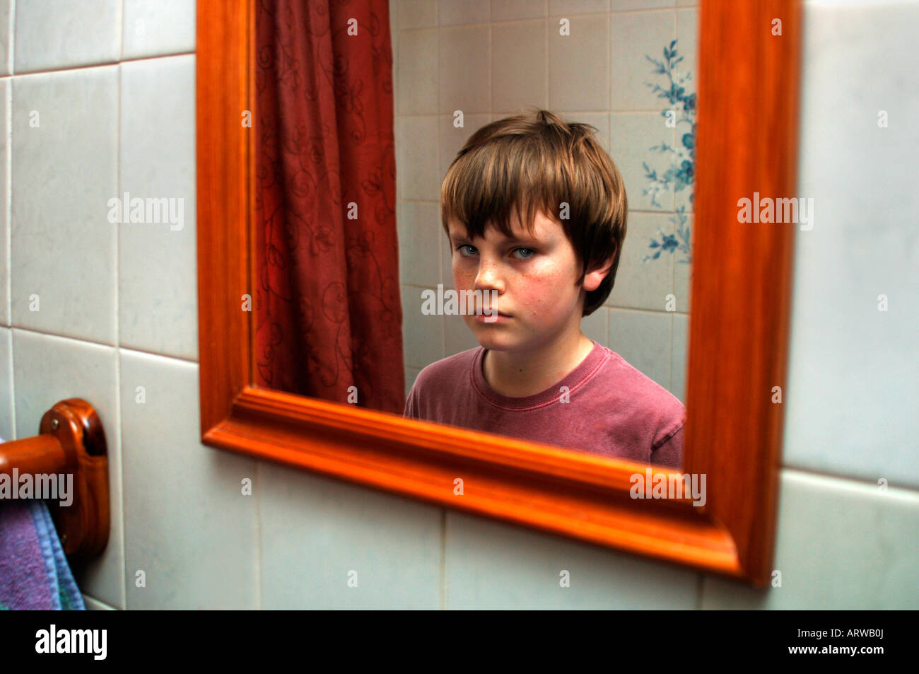 A 13yr Old Boys Reflection In A Mirror Stock Photo Alamy