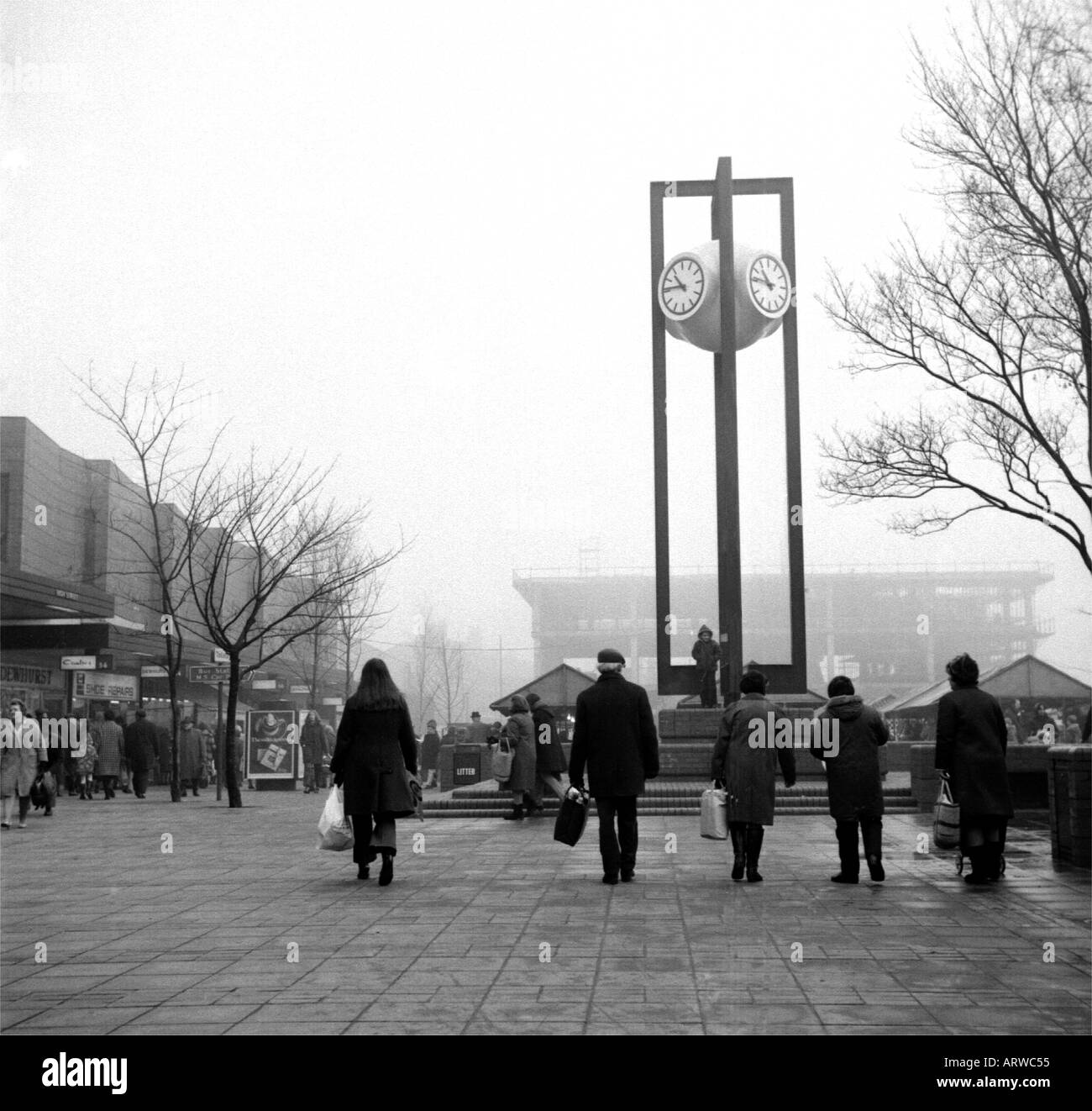 Modern clock tower in town market place in 1970 s Stock Photo