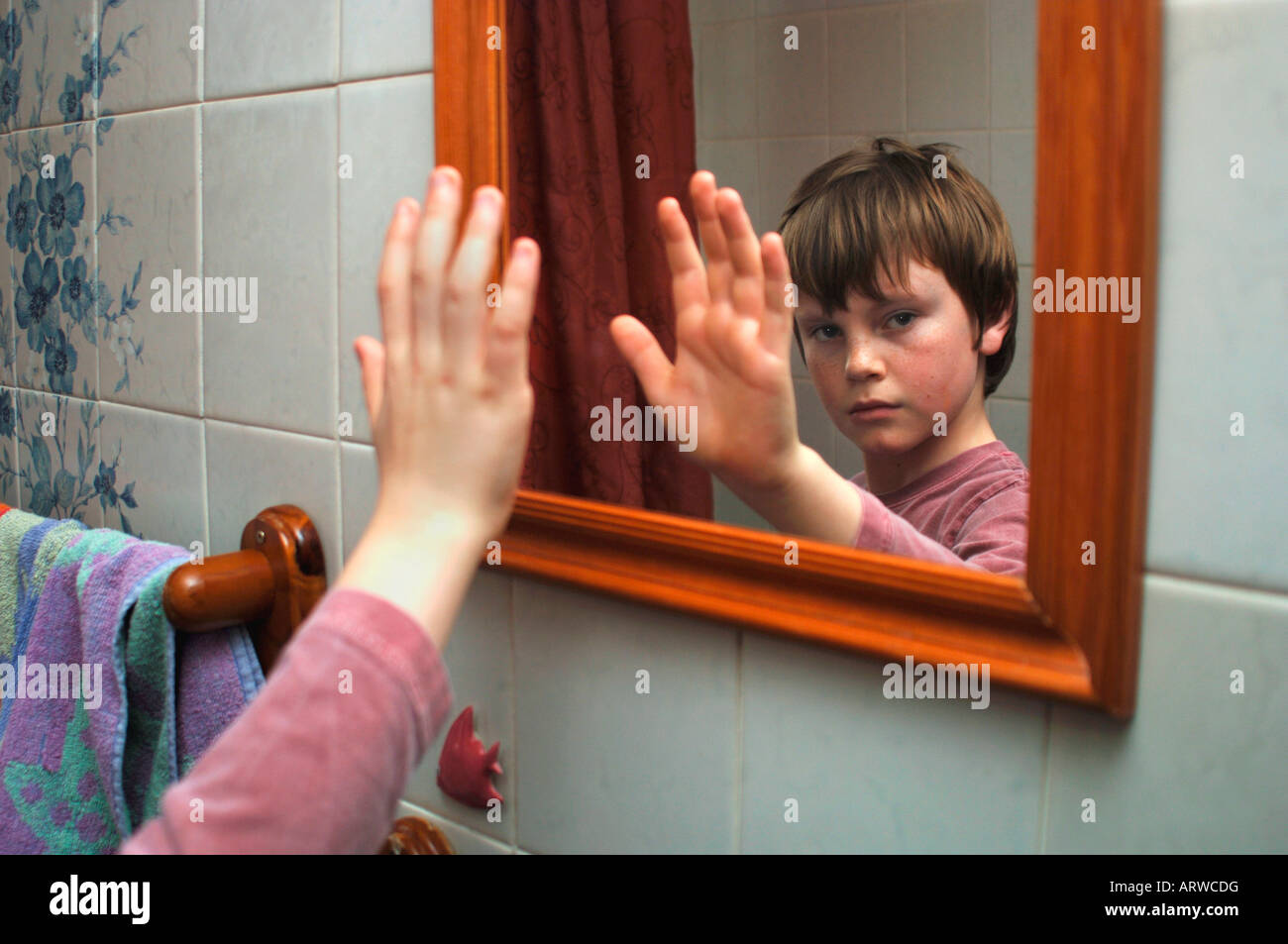 A 13yr Old Boys Reflection In A Mirror Stock Photo Alamy