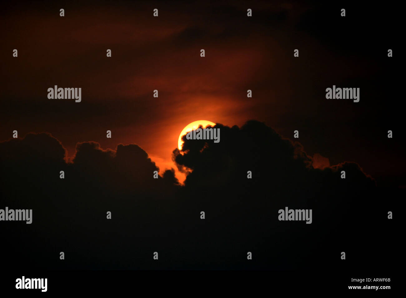 Morning sun hiding behind hi-res stock photography and images - Alamy