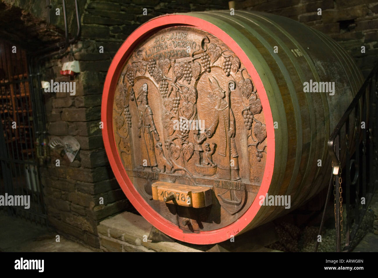 Carved end of wine barrel German wine cellar Stock Photo Alamy