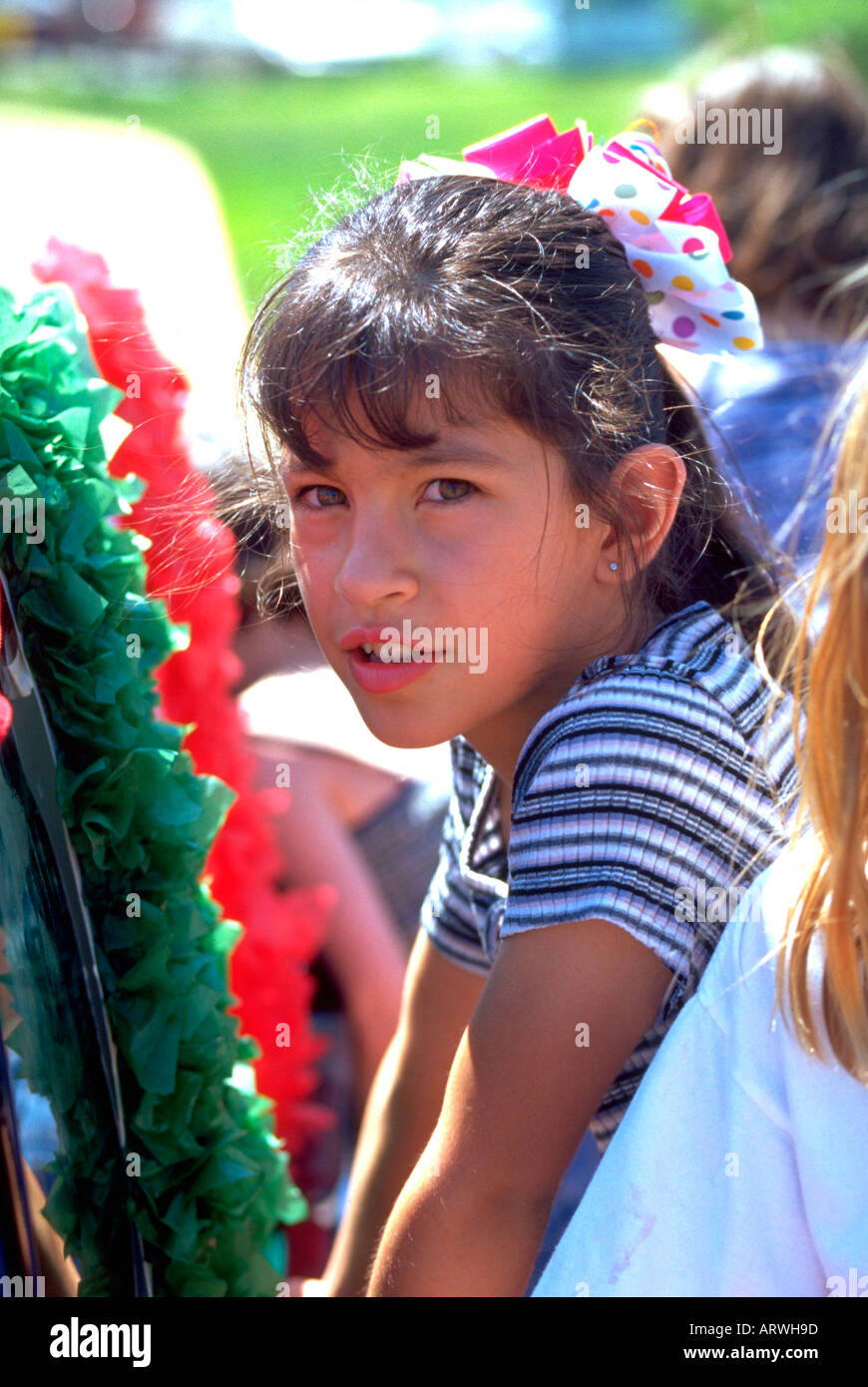 Girl age 7 at Cinco De Mayo Festival Parade. St Paul Minnesota USA Stock Photo
