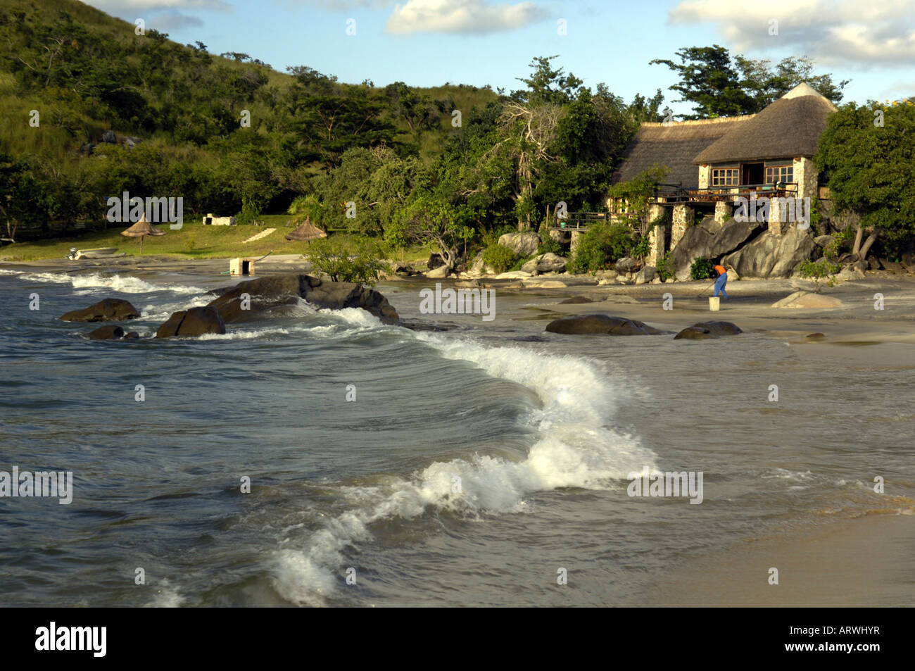 water sea at lake malawi with beach hut Stock Photo
