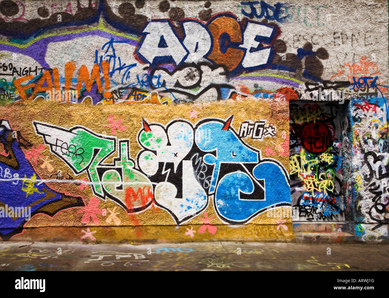 Graffiti on wall in Windmill Lane Dublin Ireland. Stock Photo