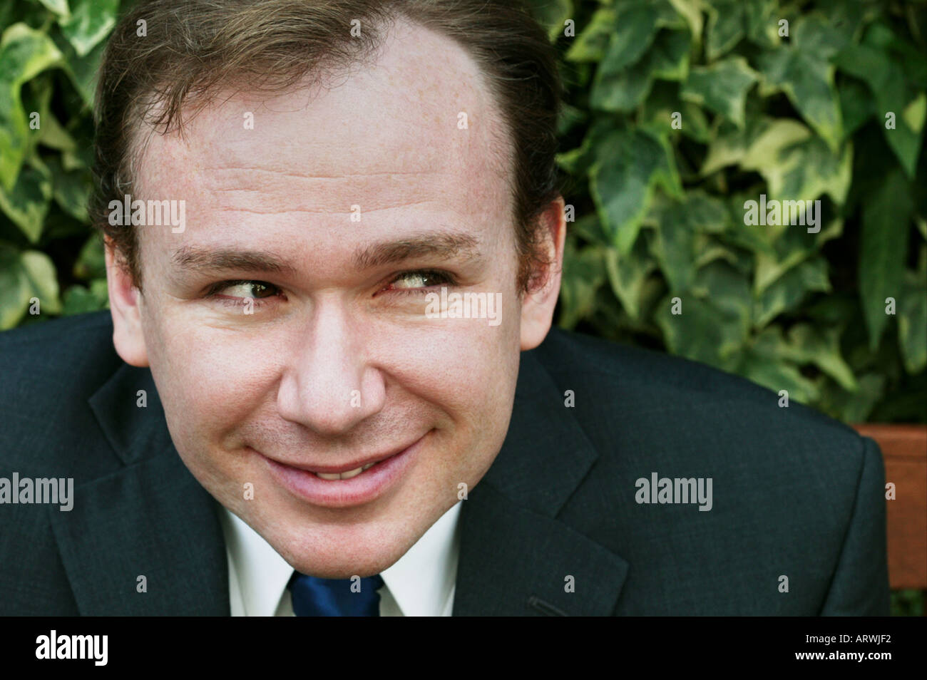 Man with naughty expression on his face Stock Photo