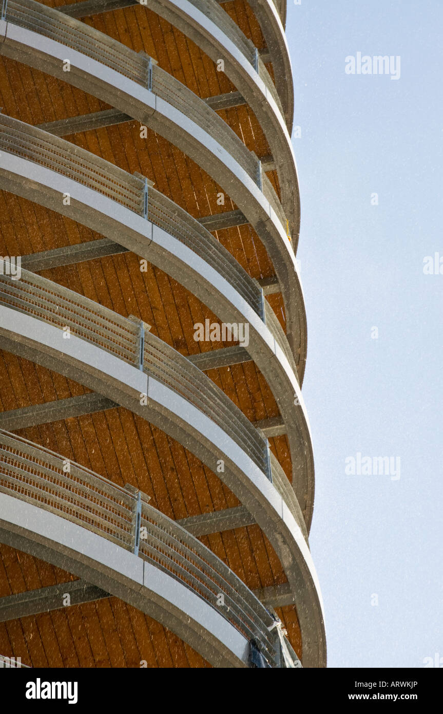 Balconies on a new apartment block, with sprinklers set off and water running off Stock Photo