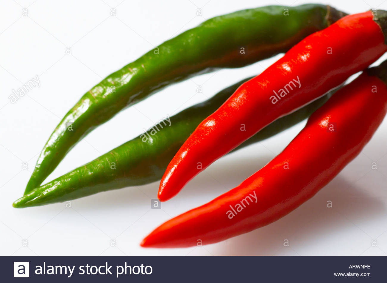 A number of Red and green birdseye chillies Stock Photo