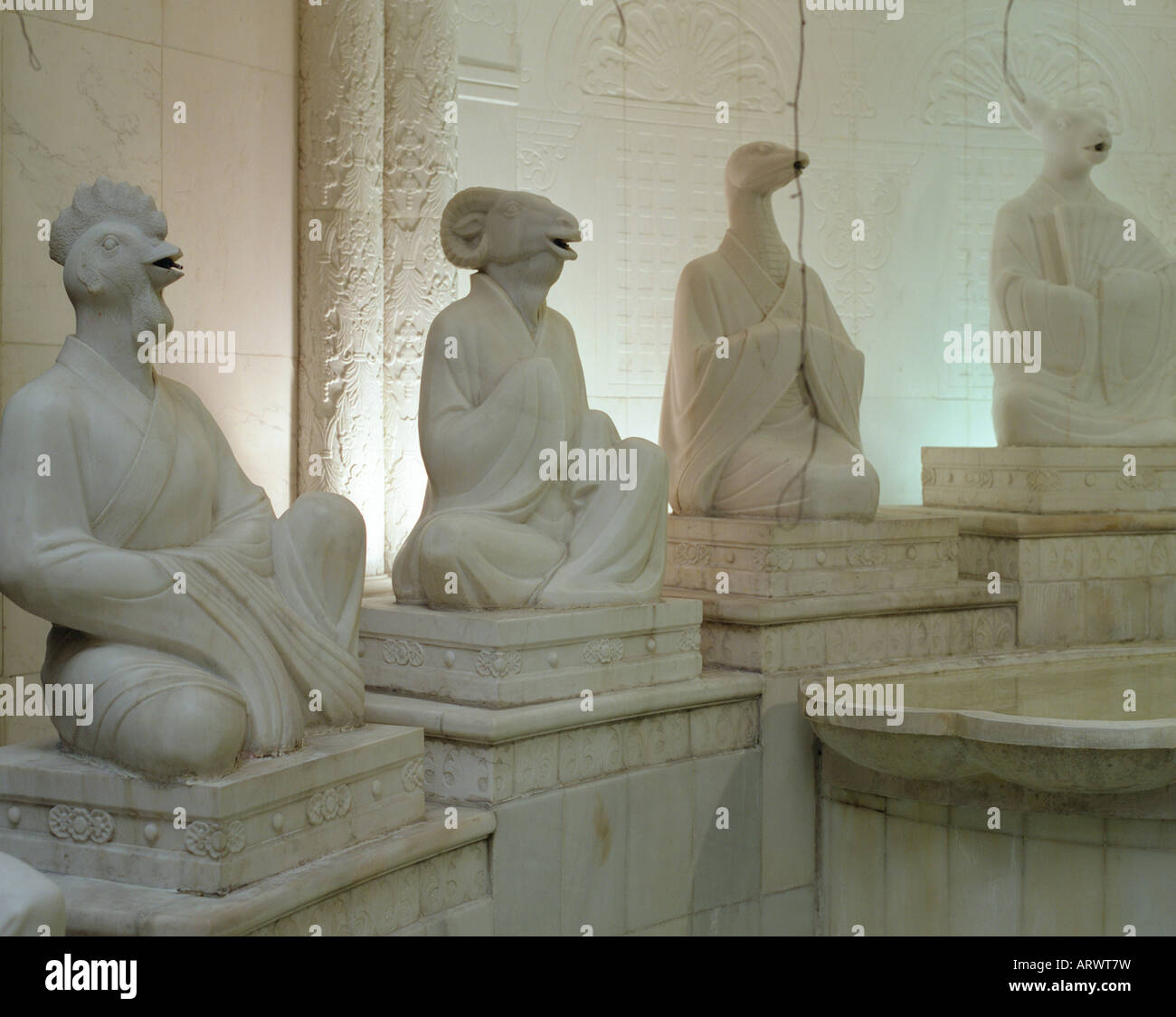 Figures from a Chinese zodiac fountain carved from marble in the Grand