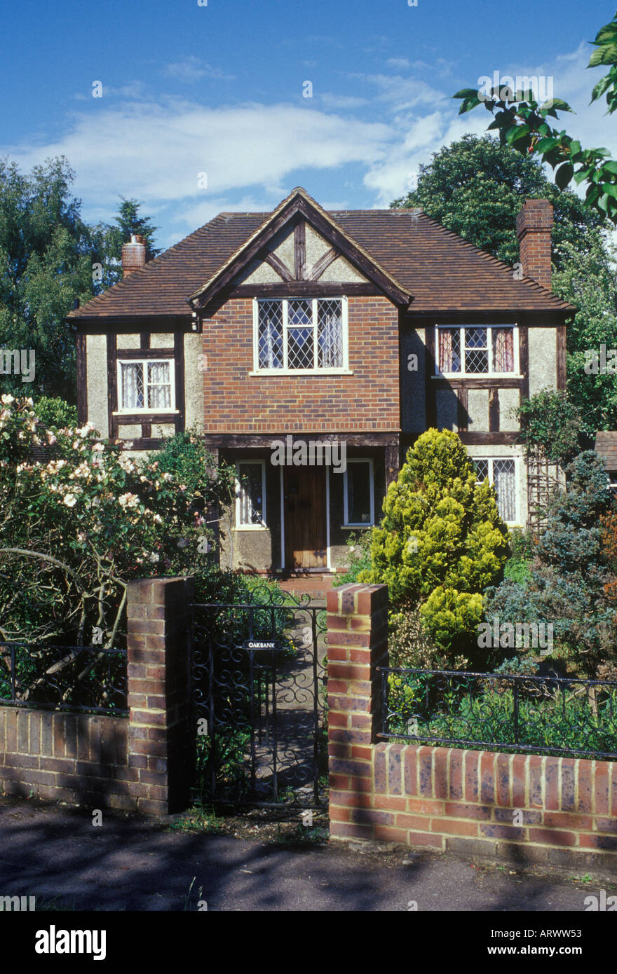 Epsom Surrey England Interwar mock Tudor detached suburban house leaded windows and half timbering pebble-dash Stock Photo