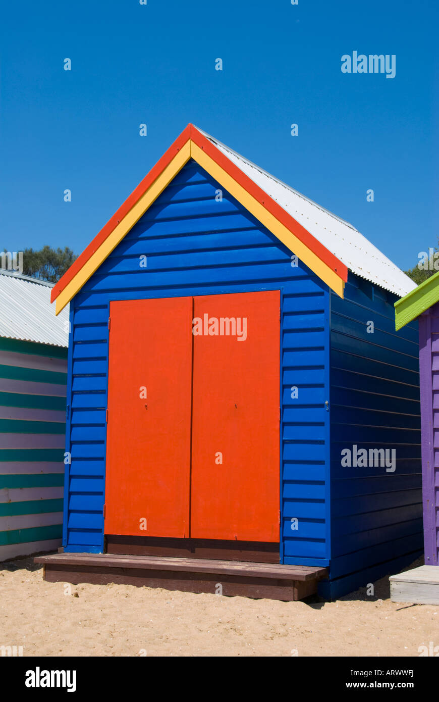 Brightly painted beach hut Stock Photo Alamy