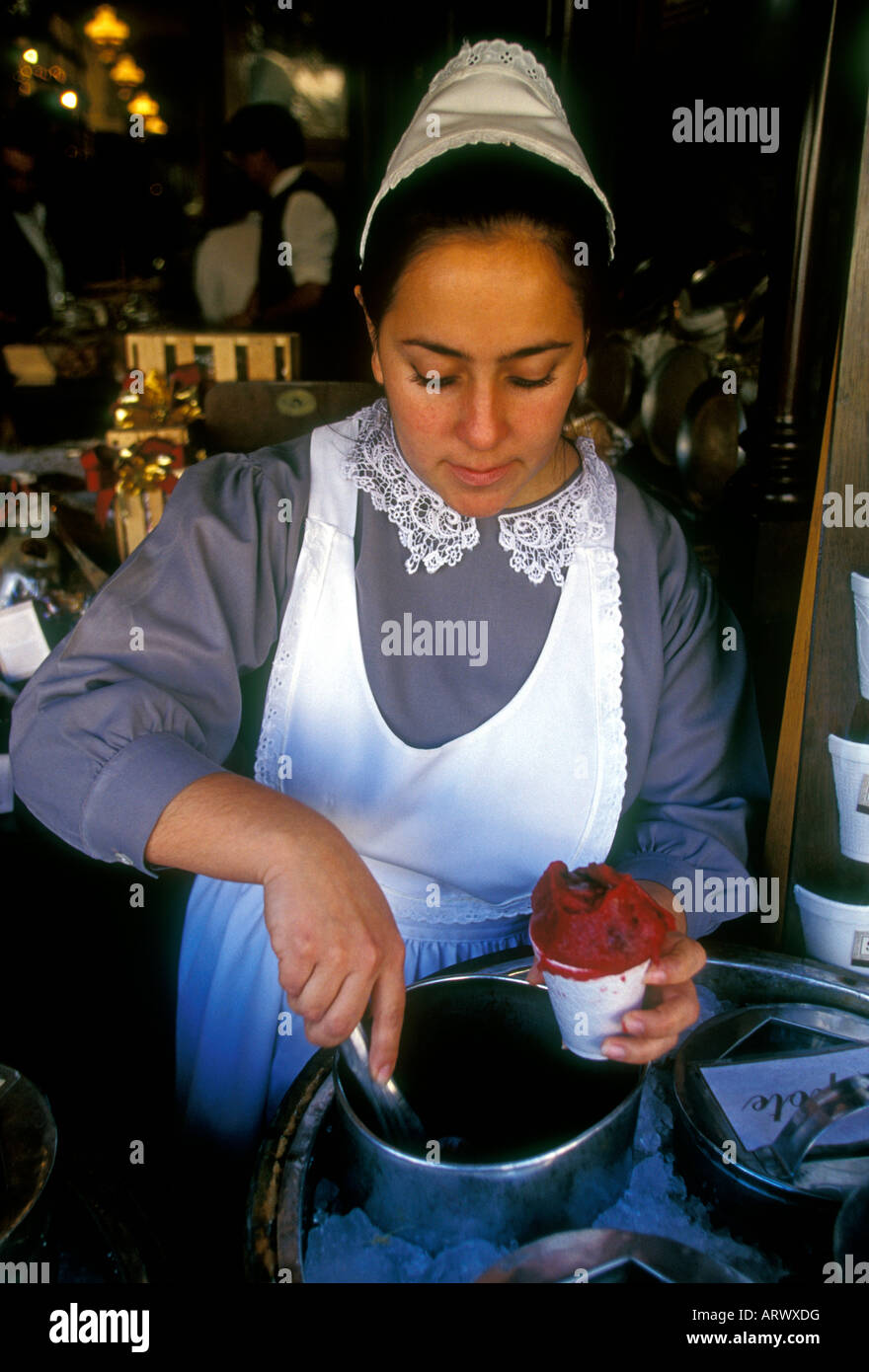 1, one, Mexican woman, young woman, server, cup frozen sorbet, ice cream parlor, candy store, city of Morelia, Morelia, Michoacan State, Mexico Stock Photo