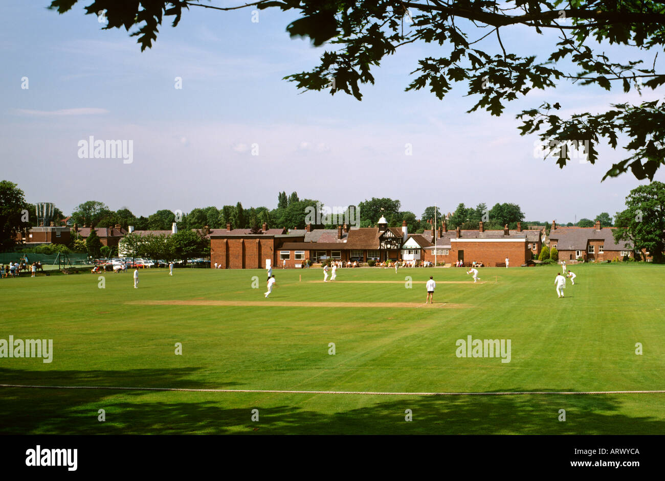 Cheshire Alderley Edge village cricket match in progress Stock Photo
