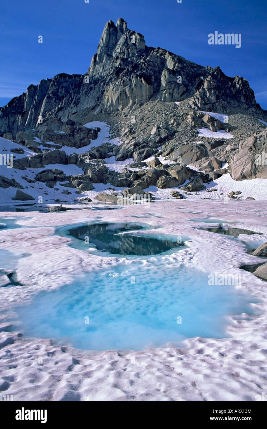 Crescent Spire snow melt pond Bugaboo Glacier Provincial Park British Columbia Canada Stock Photo