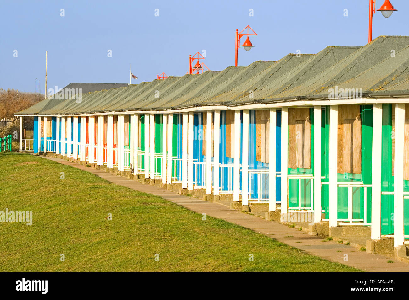 Row of Beach Huts shuttered for winter at Mablethorpe Stock Photo Alamy