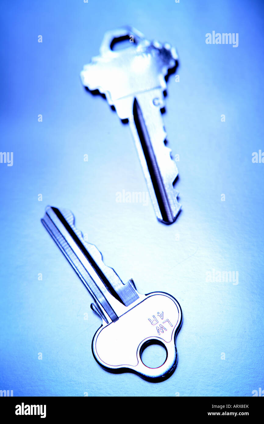 Two house keys, blue tone Stock Photo - Alamy