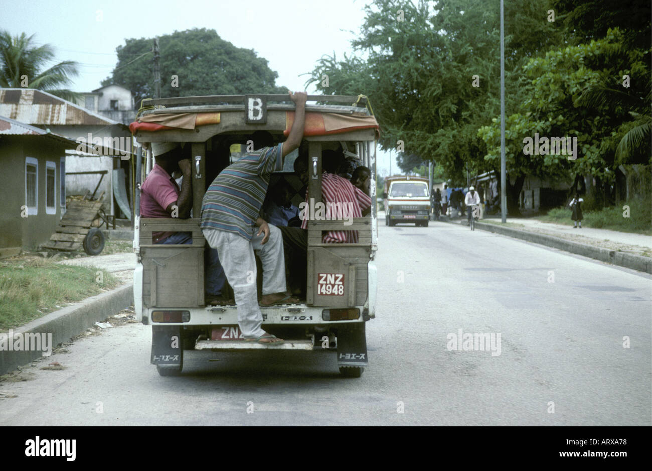 An overcrowded taxi or matatu Zanzibar Tanzania East Africa Stock Photo