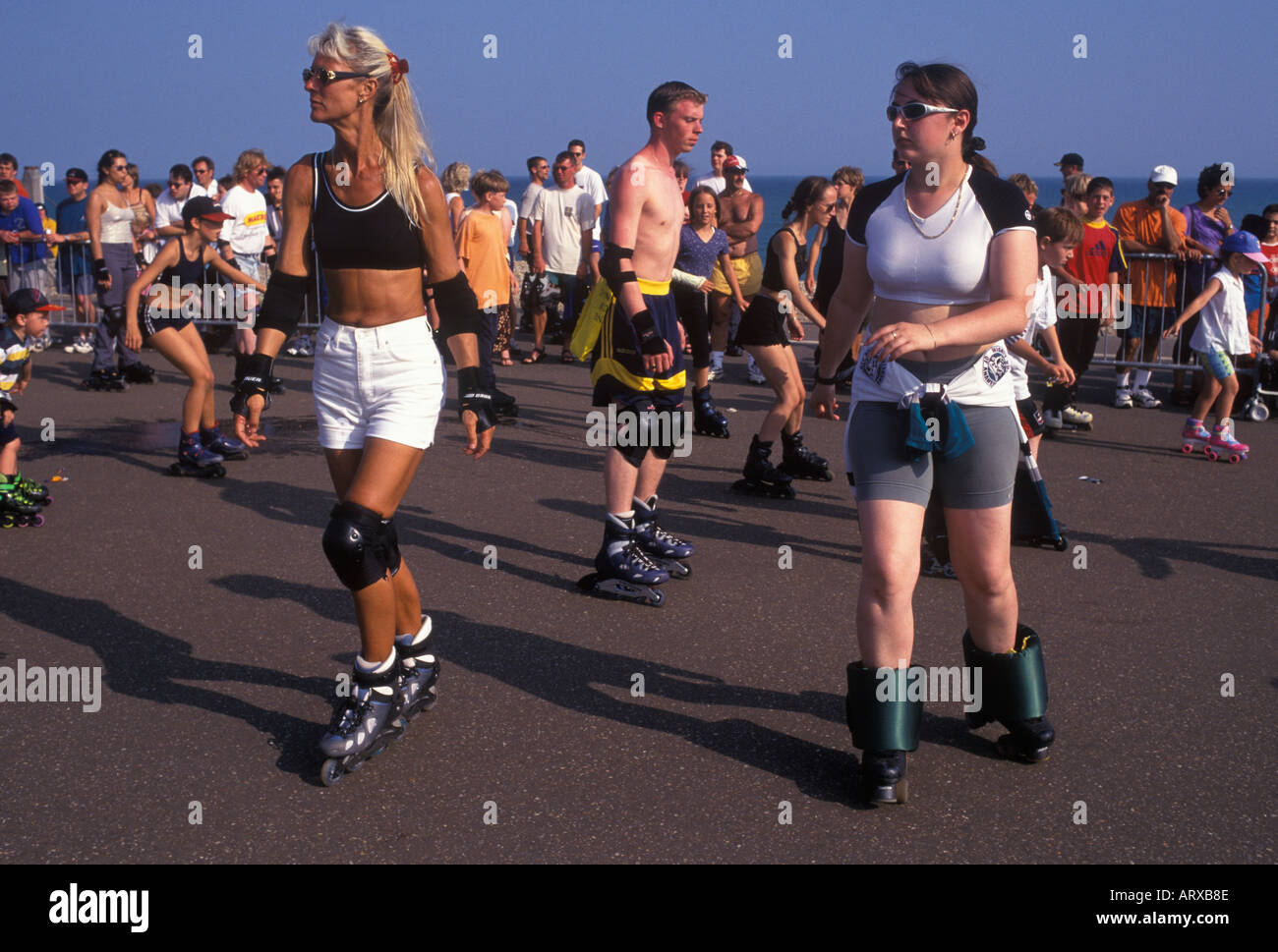 Dancing on roller skates 1990s UK. Group young people roller skating Eastbourne England circa 1995 HOMER SYKES Stock Photo