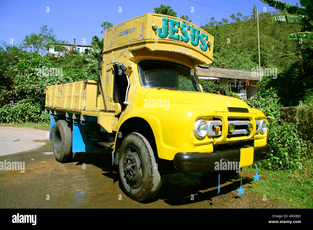 truck parked on hilly road south india Stock Photo