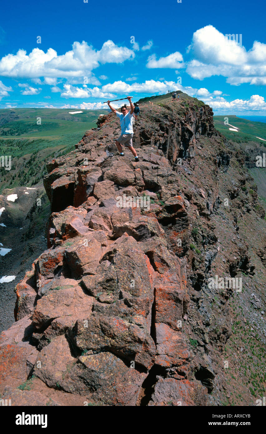 Man on The Devil's Causeway hiking route Flattops Wilderness area Routt National Forest CO USA Stock Photo