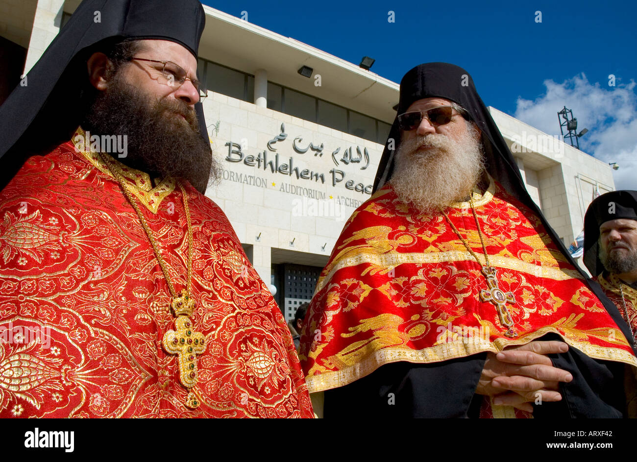 Palestinian Authority Bethlehem church of the Nativity Orthodox Xmas Procession outside the the church portrait of 2 priests in religious dress Stock Photo