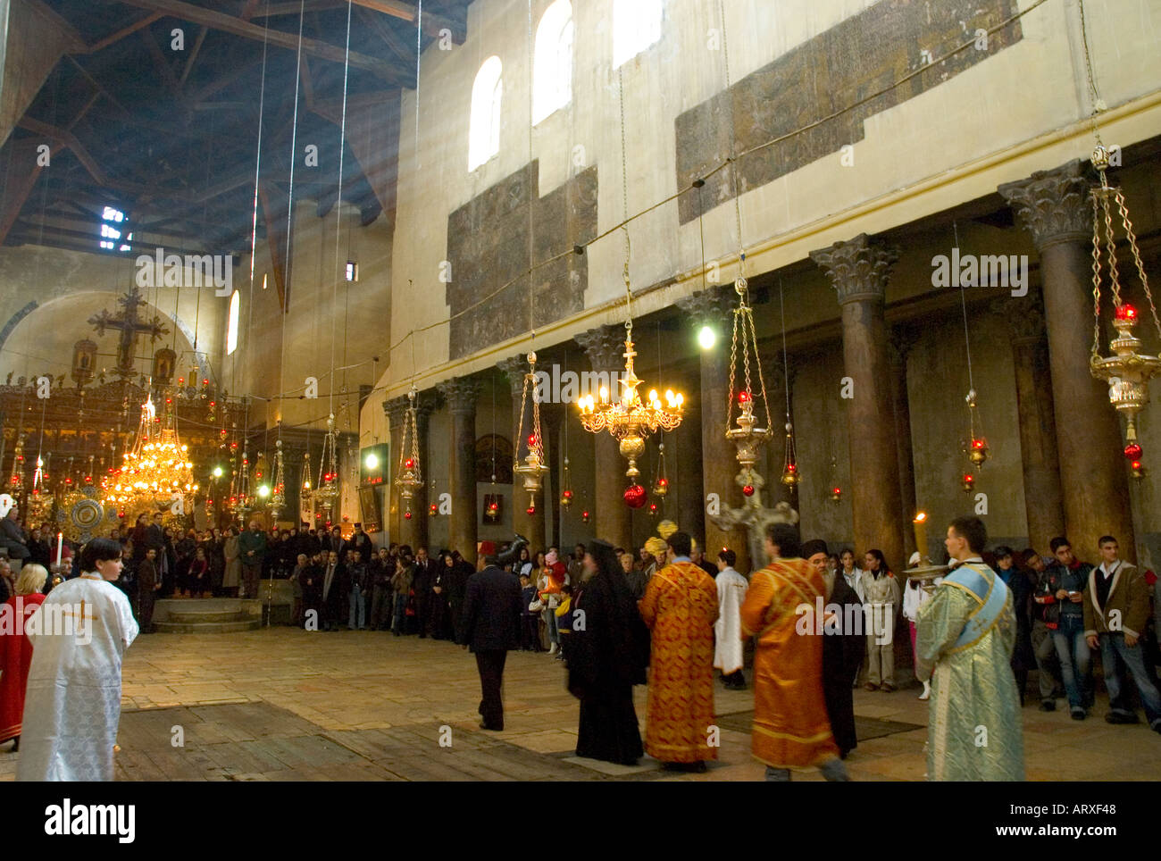 Palestinian Authority Bethlehem church of the Nativity Orthodox Xmas Procession back in the church Stock Photo