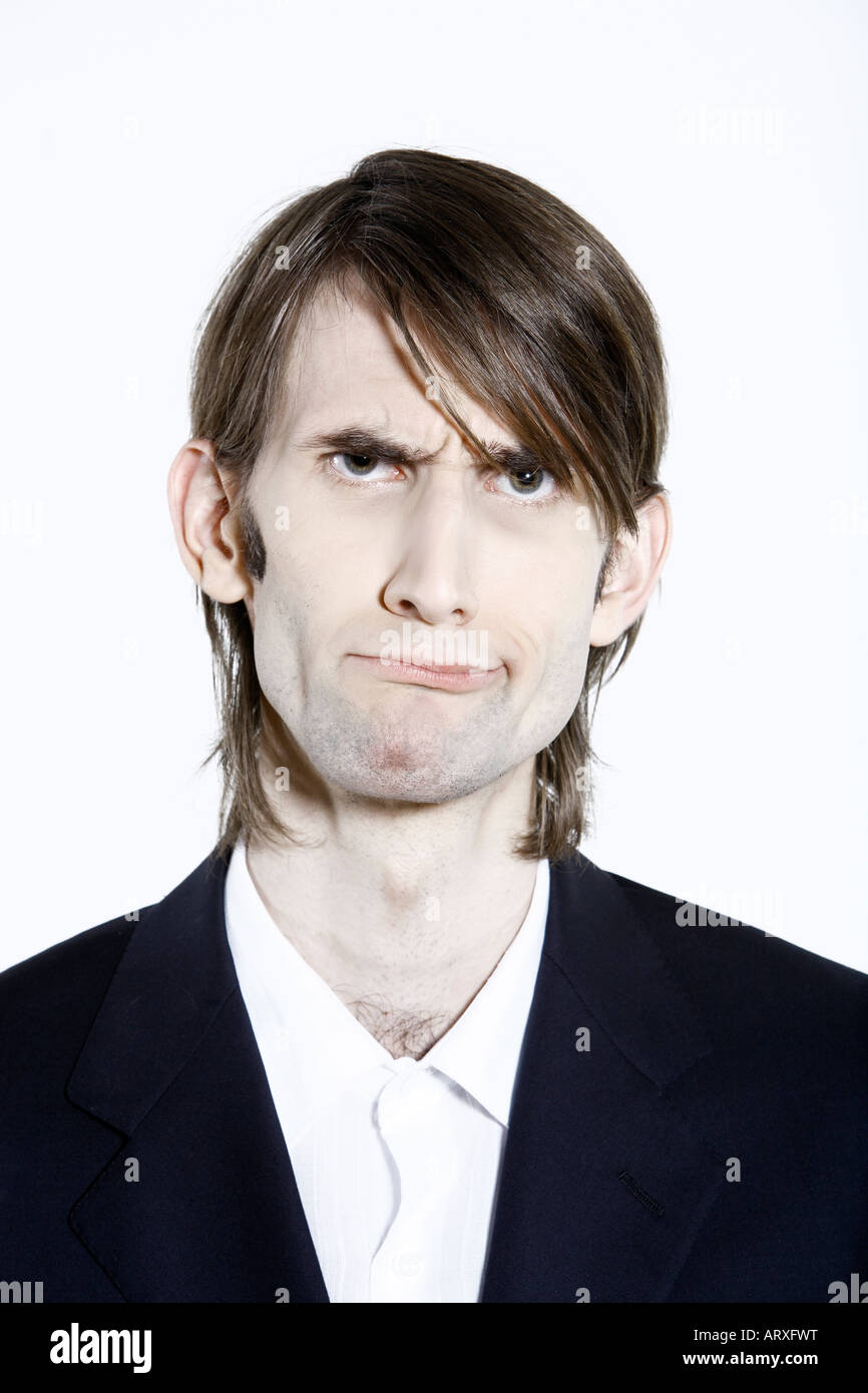 Studio Shot Portrait Of A Young Funny Expressive Thin And Tall Man