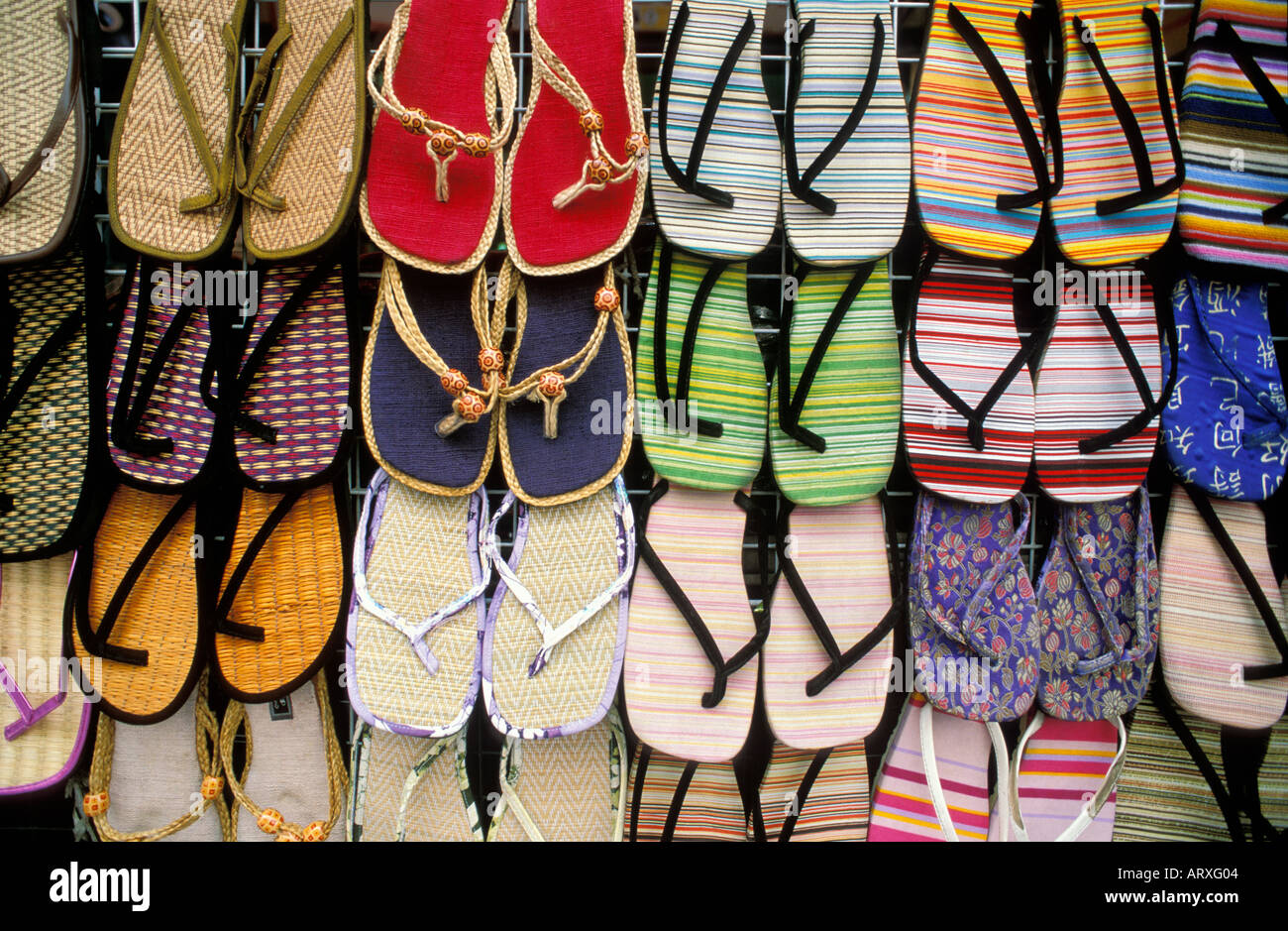 Coloured sandals on a stall, Khao San Road, Bangkok, Thailand Stock