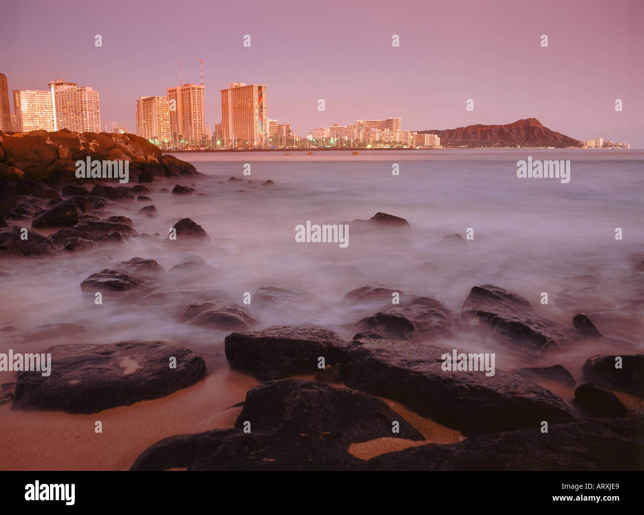 Waikiki Beach hotels and Diamond Head at sunset in Honolulu on Oahu