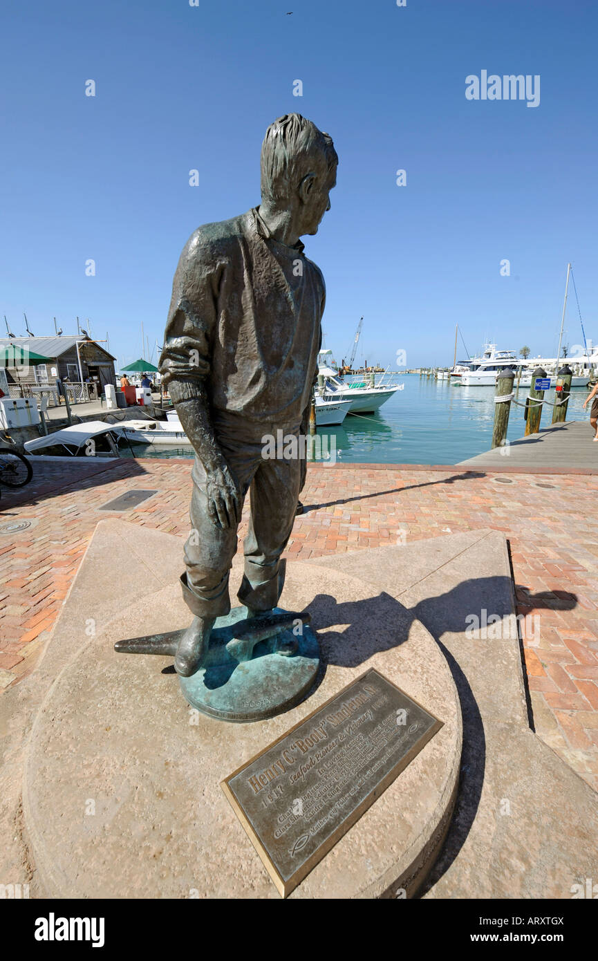 Statue comemorating Henry Singleton Sr Key West Florida harbor boats memorial monument history