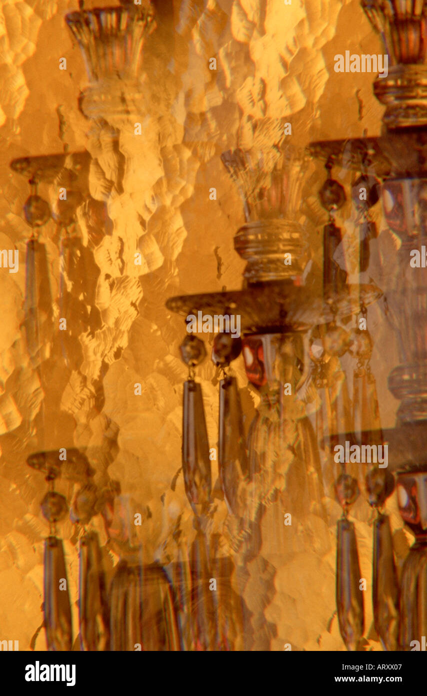 impressionistic candelabra behind textured glass still life special effect repeating image photographed through prism Stock Photo