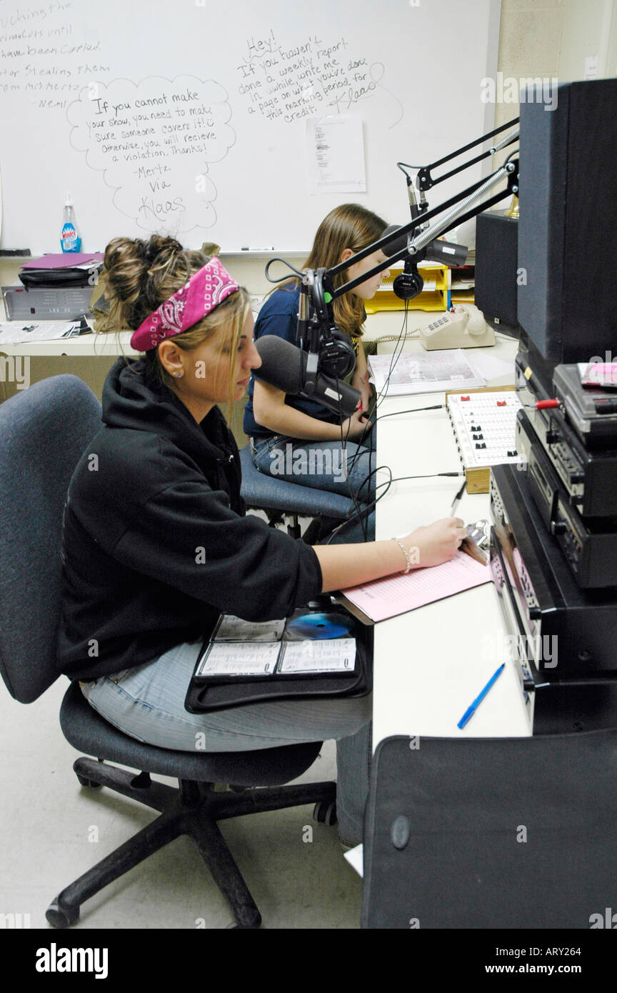 Female high school student works in a radio station as part of a classroom  credit learning experience in broadcasting Stock Photo - Alamy