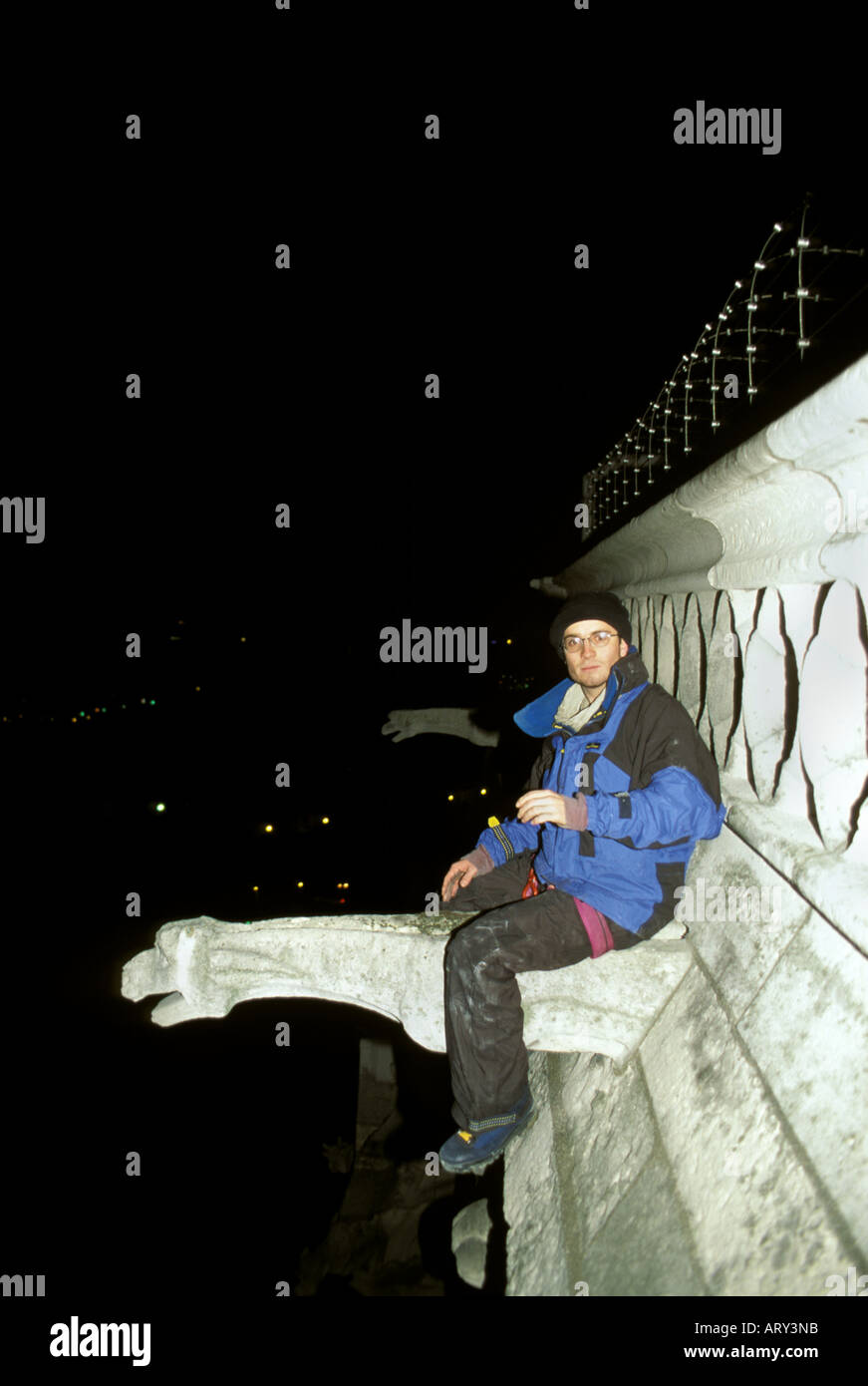 Paris clandestine climbing of the Notre Dame by night Stock Photo Alamy